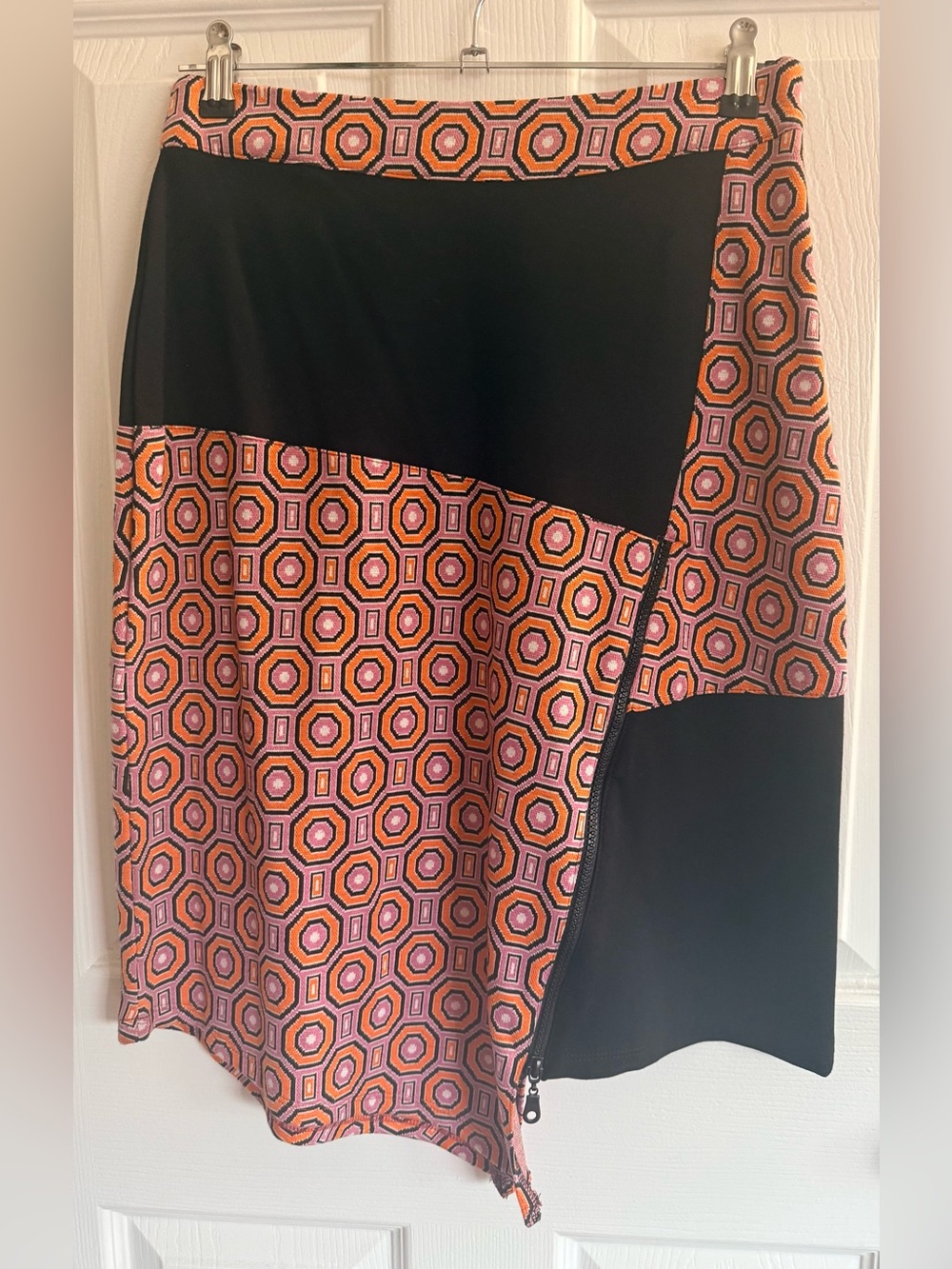 Isle: Geometric Paneled Midi Skirt in Orange and Black